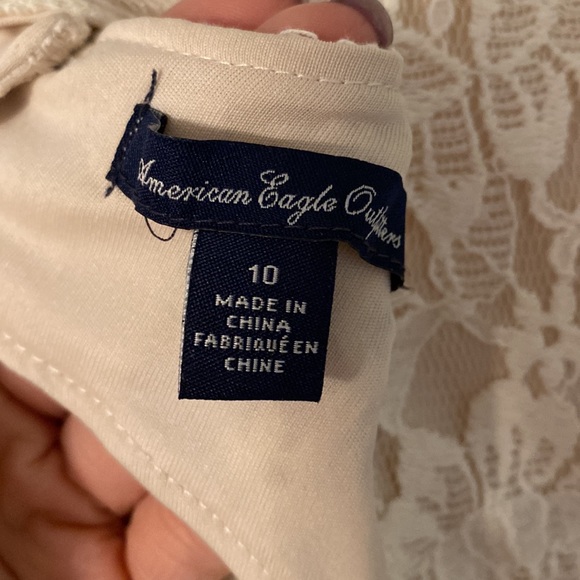 Short cream-coloured lace dress with back cut-out - Picture 3 of 3